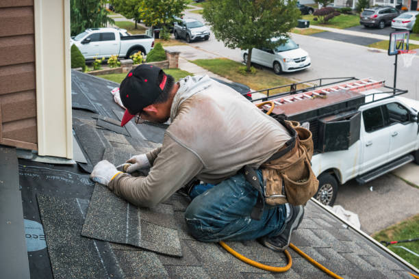 Professional Flat Roof Repair technician working in Tewksbury, MA